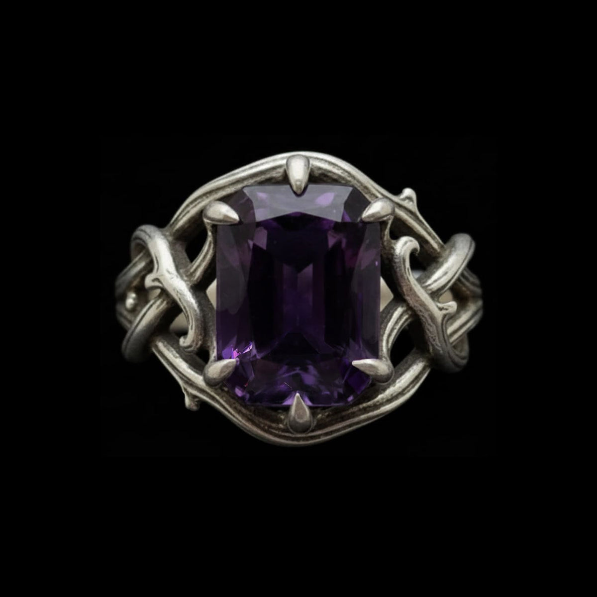 close-up of the thorns of devotion luxury gothic ring with amethyst gemstone