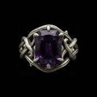 close-up of the thorns of devotion luxury gothic ring with amethyst gemstone