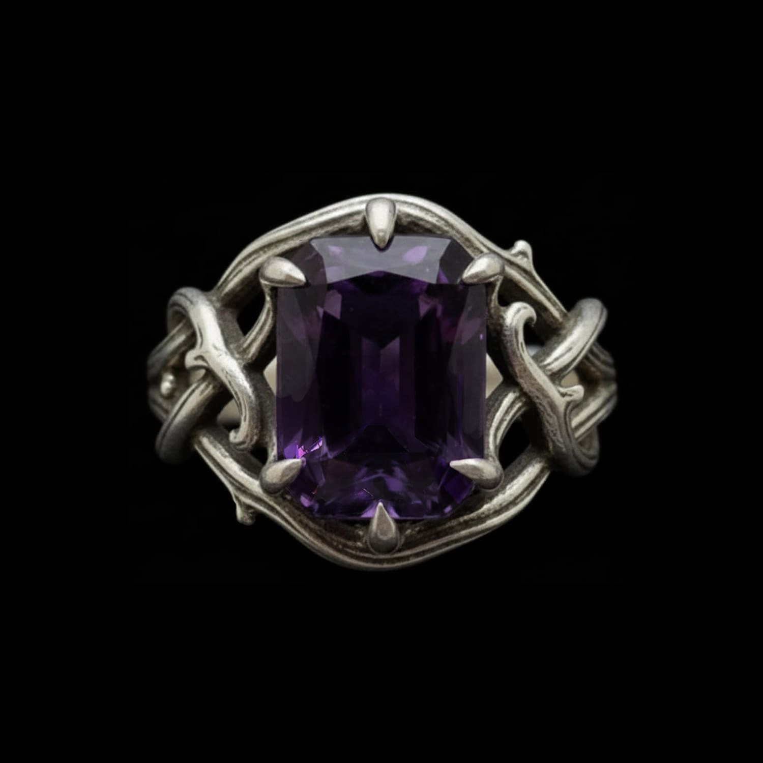 close-up of the thorns of devotion luxury gothic ring with amethyst gemstone