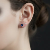 deep midnight blue heat earring on model 