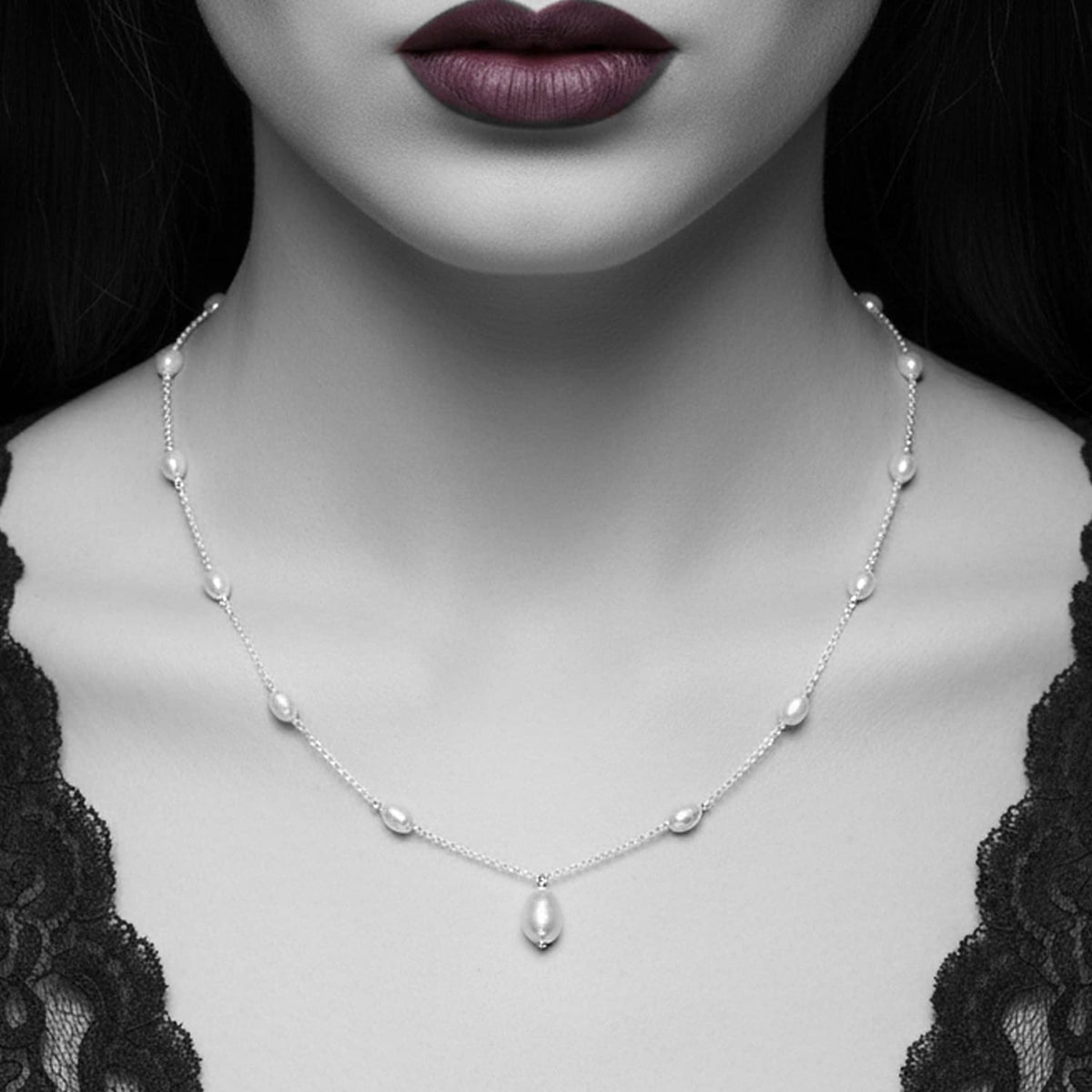 gothic bridal pearl tear necklace, white pearls on a delicate sterling silver chain with Victorian Gothic elegance 