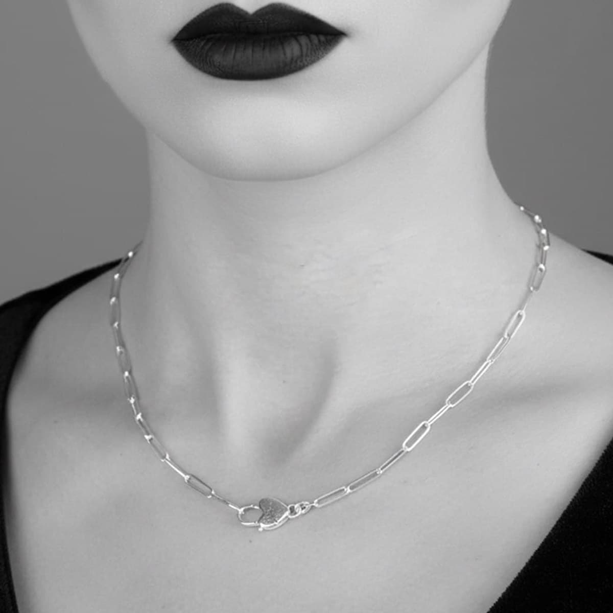 heart silver necklace on goth girl