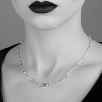 heart silver necklace on goth girl