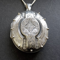 close-up of large oval gothic victorian locket 