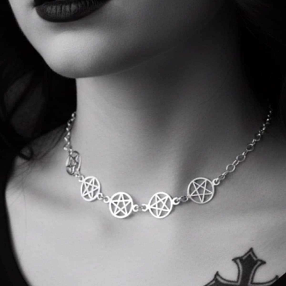 silver pentagram choker necklace worn by gothic pagan model