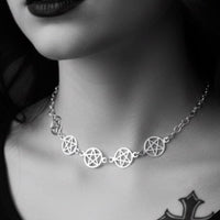 silver pentagram choker necklace worn by gothic pagan model