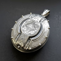 sterling silver Victorian gothic locket side profile showing rivet stud detail 