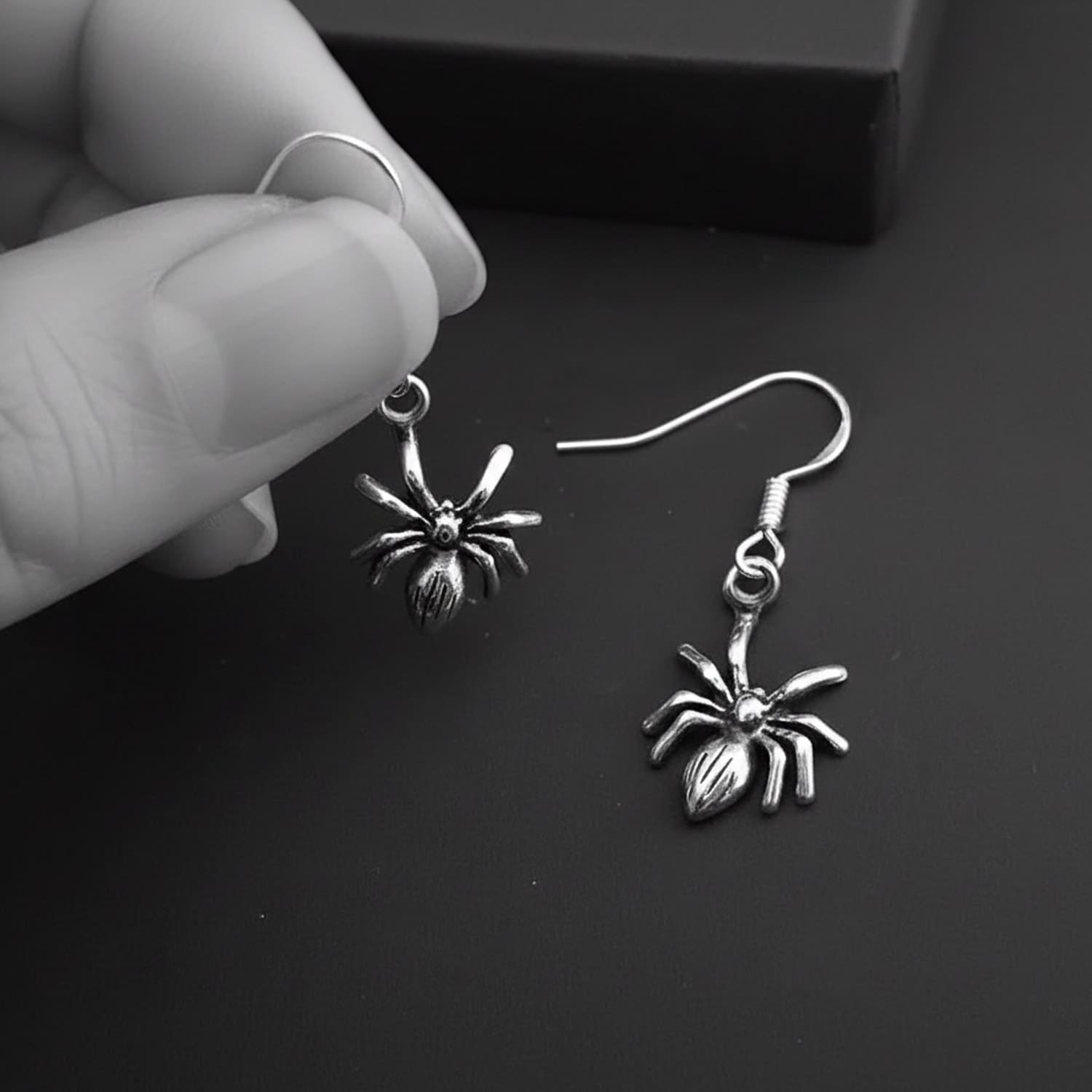 silver spider dangle earrings 