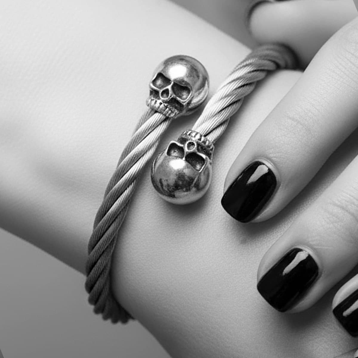 steel skull bracelet on goth girl