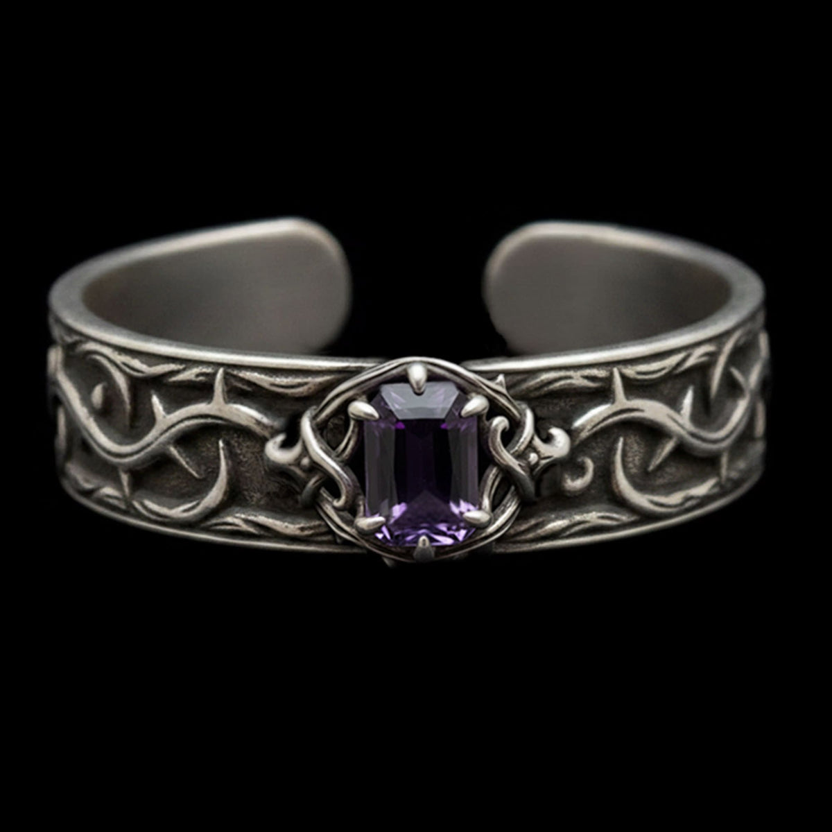 the thorns of devotion gothic cuff bracelet in sterling silver with heavy oxidised thorn patterning and a dark amethyst claw-set stone