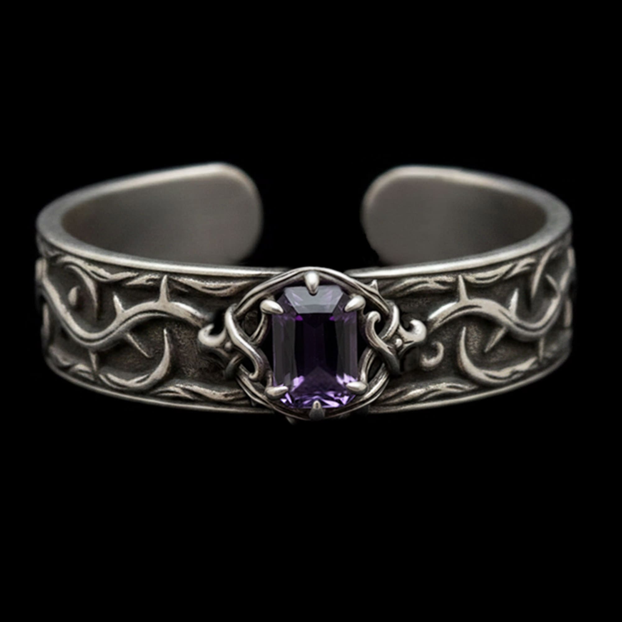 the thorns of devotion gothic cuff bracelet in sterling silver with heavy oxidised thorn patterning and a dark amethyst claw-set stone
