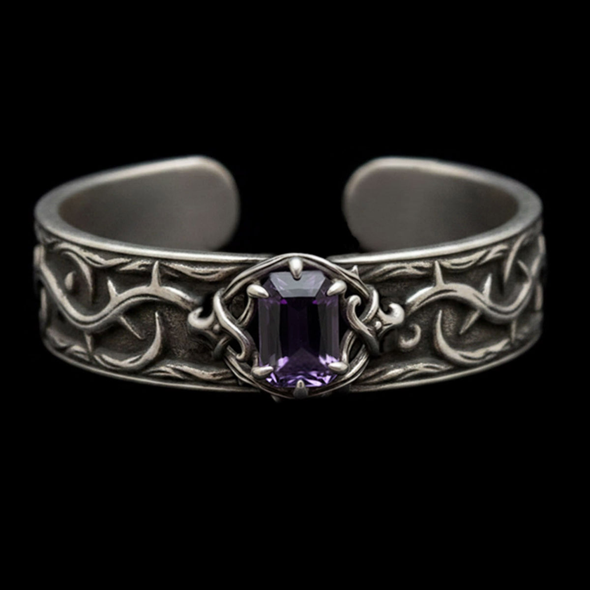 the thorns of devotion gothic cuff bracelet in sterling silver with heavy oxidised thorn patterning and a dark amethyst claw-set stone