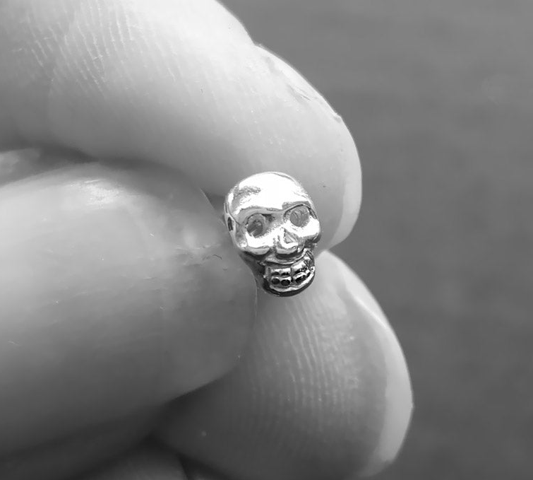 tiny skull earrings
