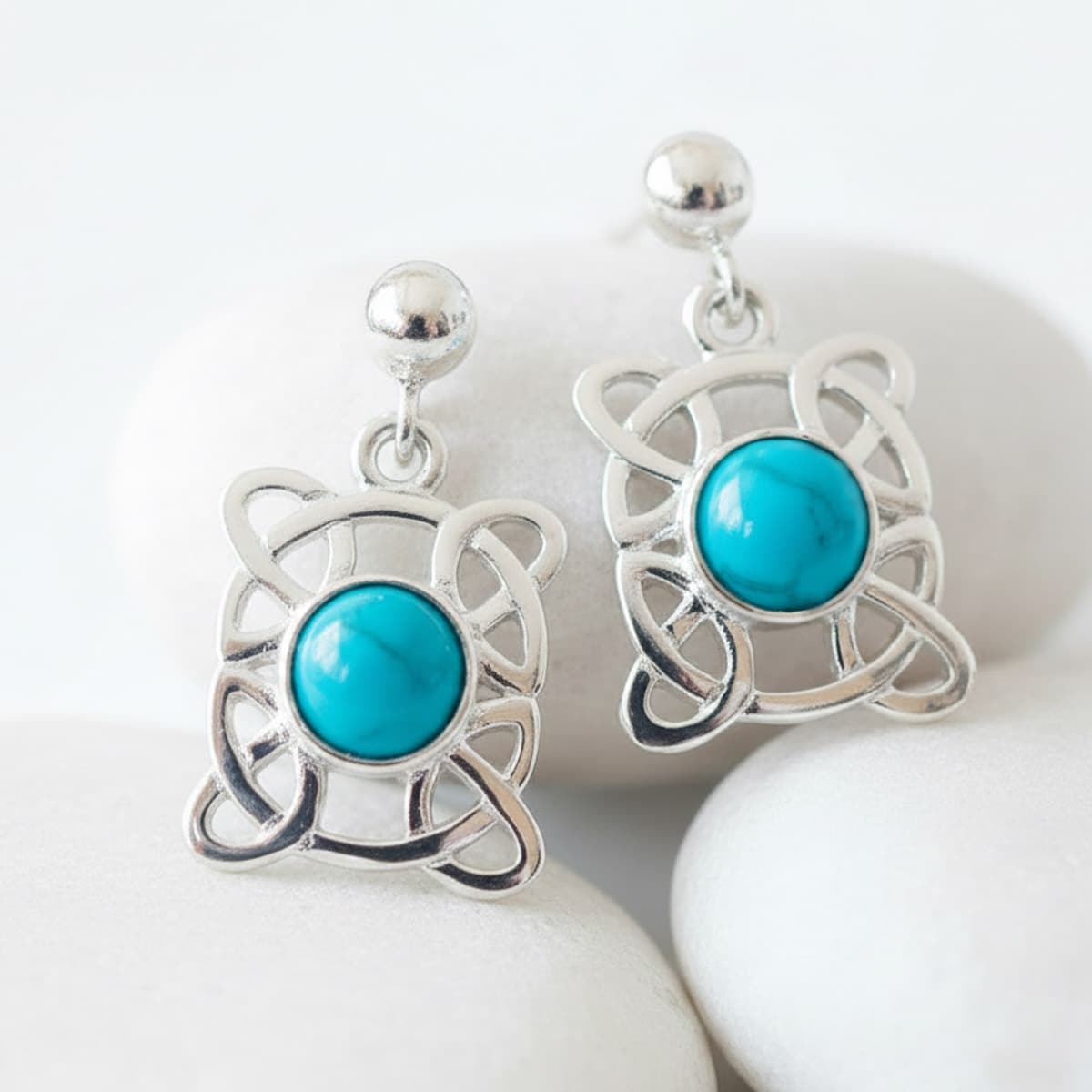 silver celtic earrings with turquoise stone